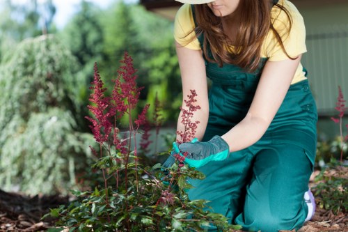 Local gardeners in Upton working on a well-kept landscape